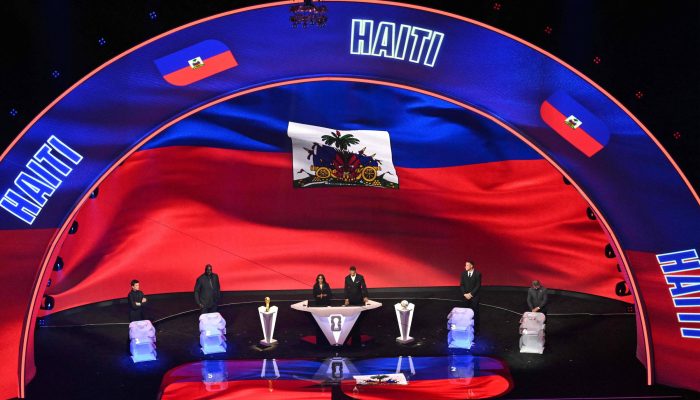 Momento em que o Haiti é sorteado para o Grupo C da Copa do Mundo
             -       
        Roberto Schmidt/AFP