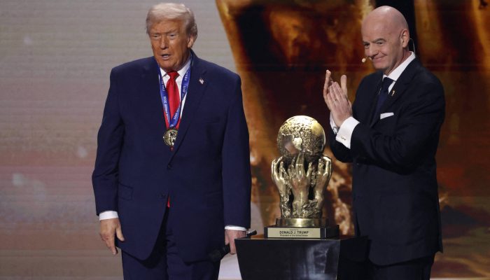 Trump e Infantino no sorteio dos grupos da Copa-2026, em Washington
             -       
        Amber Searls - 5.dez.25/Imagn Images via Reuters